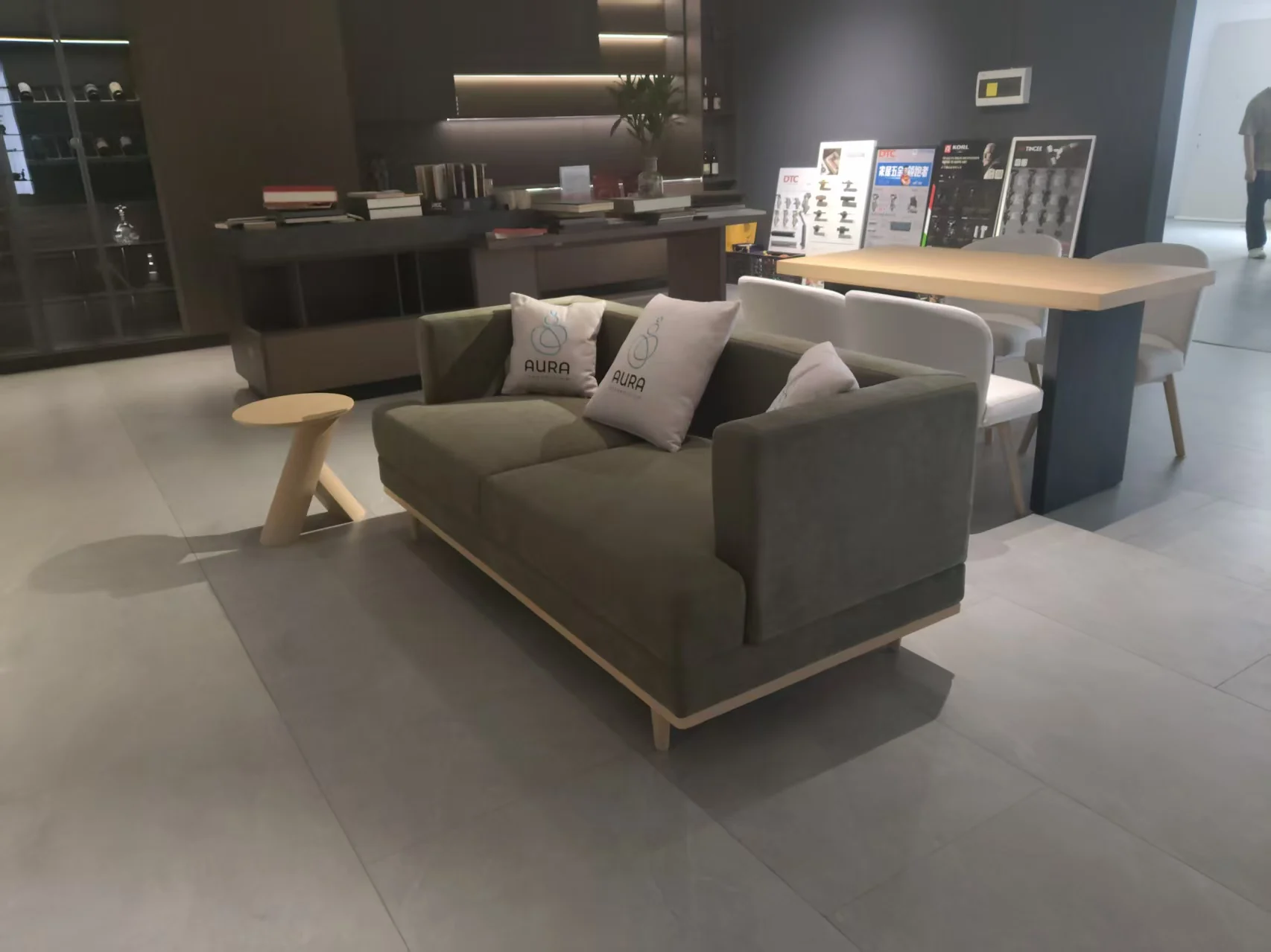 Client mock-up review of the sofa, dining area and material composition